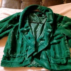 Green half cut fur size and a black fur vest both soft one for 65 or both 100